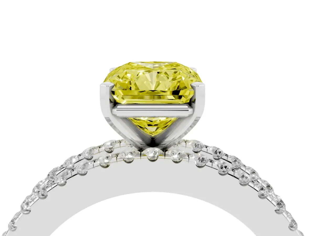 Fancy Yellow Radiant Cut Diamond Solitaire Ring with Pavé and Channel Set Band Platinum