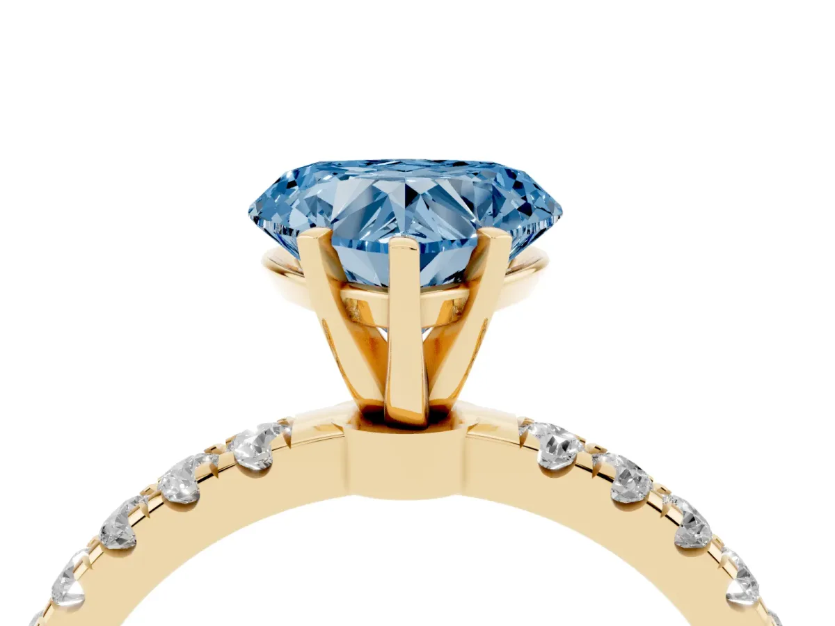 Fancy Blue Heart Cut Diamond Solitaire Ring with Pavé Accents and Four-Prong Setting Yellow gold