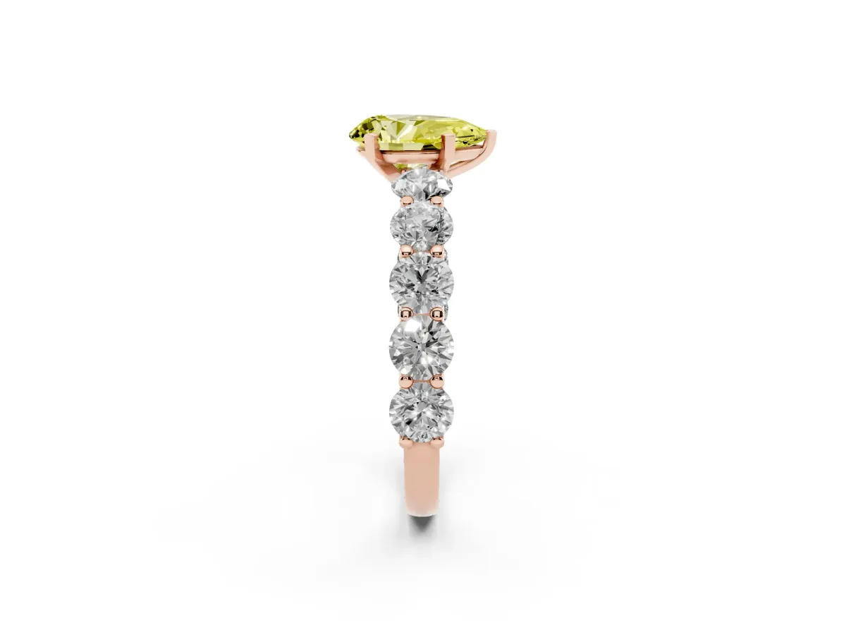 Fancy Yellow Pear Cut Diamond Prong Setting with Side Stones on a Pave Band Rose gold