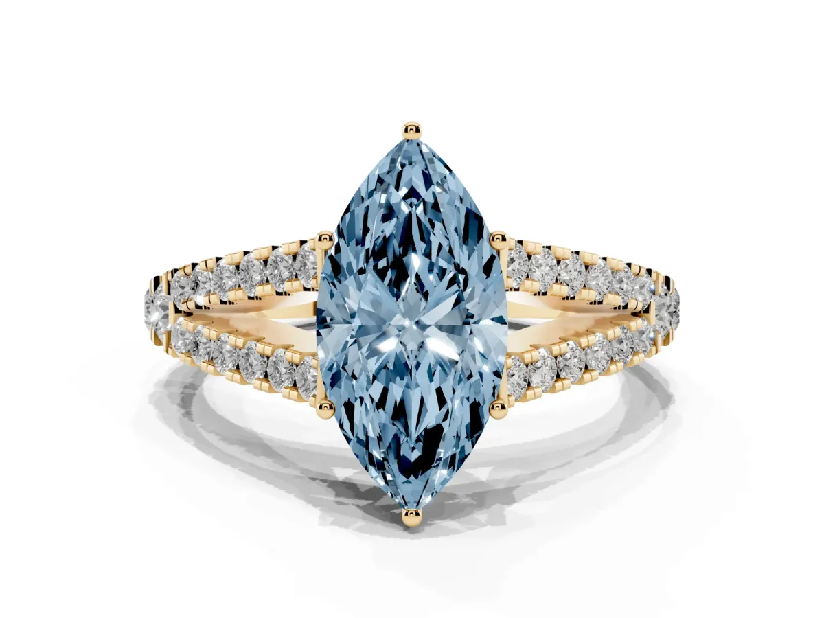 Fancy Blue Marquise Cut Diamond Split Shank Pavé Engagement Ring with Four-Prong Setting Yellow gold