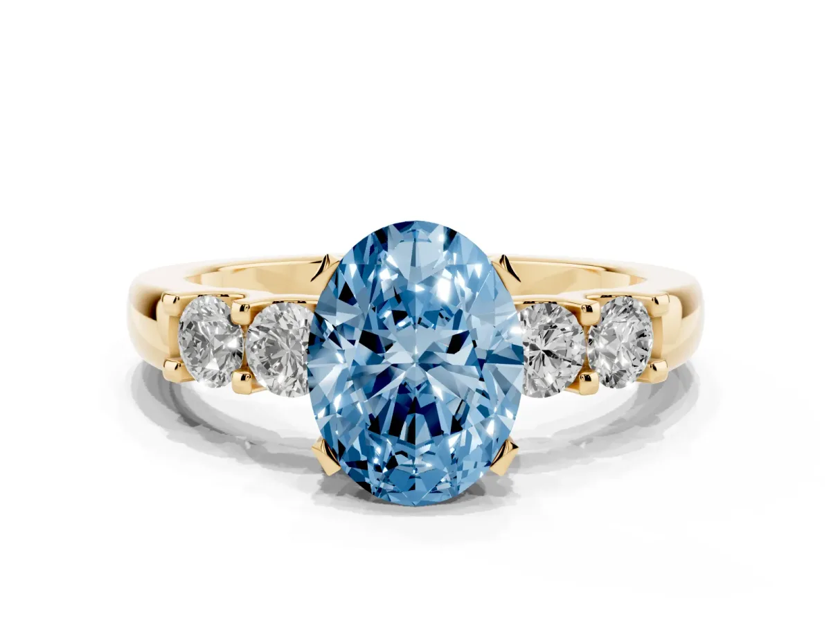 Fancy Blue Oval Cut Brilliant Cut Diamond Five-Stone Prong Set Engagement Ring with Channel Band Yellow gold