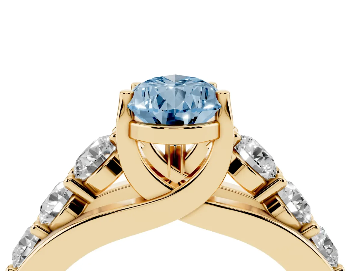 Fancy Blue Pear Cut Diamond Engagement Ring with Pavé Band and Four-Prong Setting Yellow gold