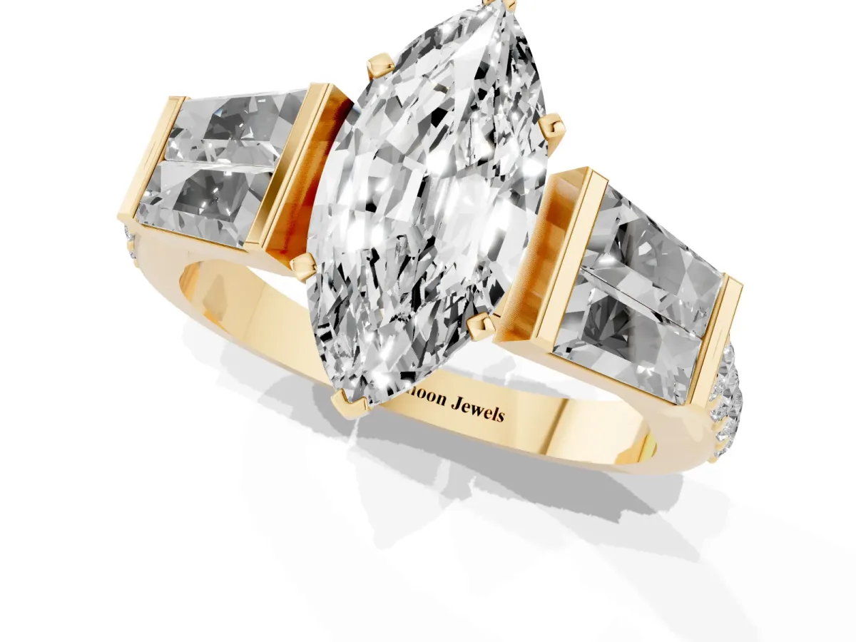 Marquise Cut Diamond Engagement Ring with Baguette Side Stones and Channel Set Band Yellow gold