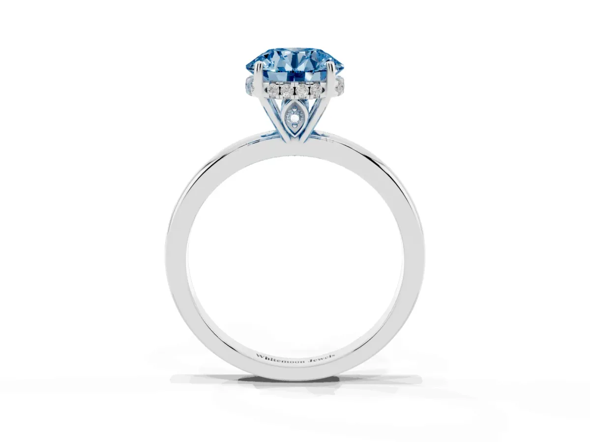 Fancy Blue Round Cut Solitaire Diamond Ring with Prong Setting and Plain Band Platinum