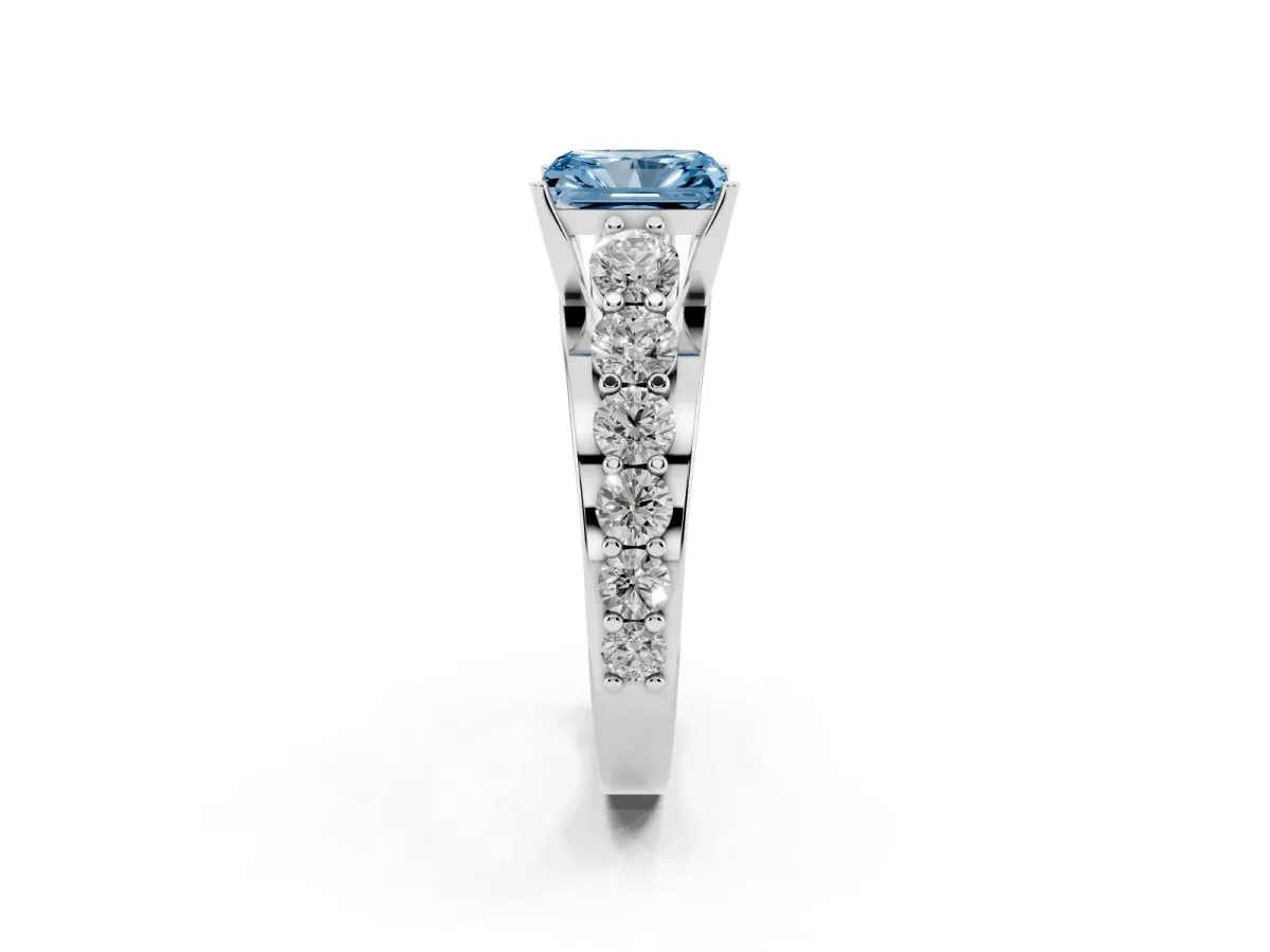 Fancy Blue Radiant Cut Diamond Engagement Ring with Pavé Band and Four-Prong Setting Silver