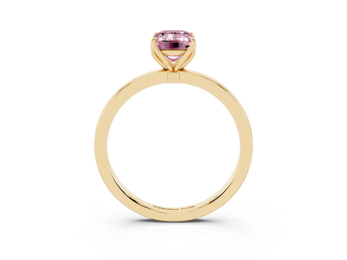 Fancy Pink Emerald Cut Diamond Solitaire Ring with Thin Band and Prong Setting Yellow gold