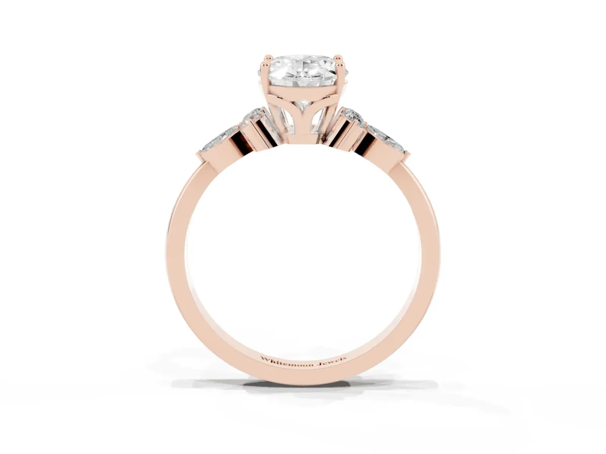 Oval Cut Brilliant Diamond Solitaire Ring with Pear Side Stones and Four-Prong Setting Rose gold