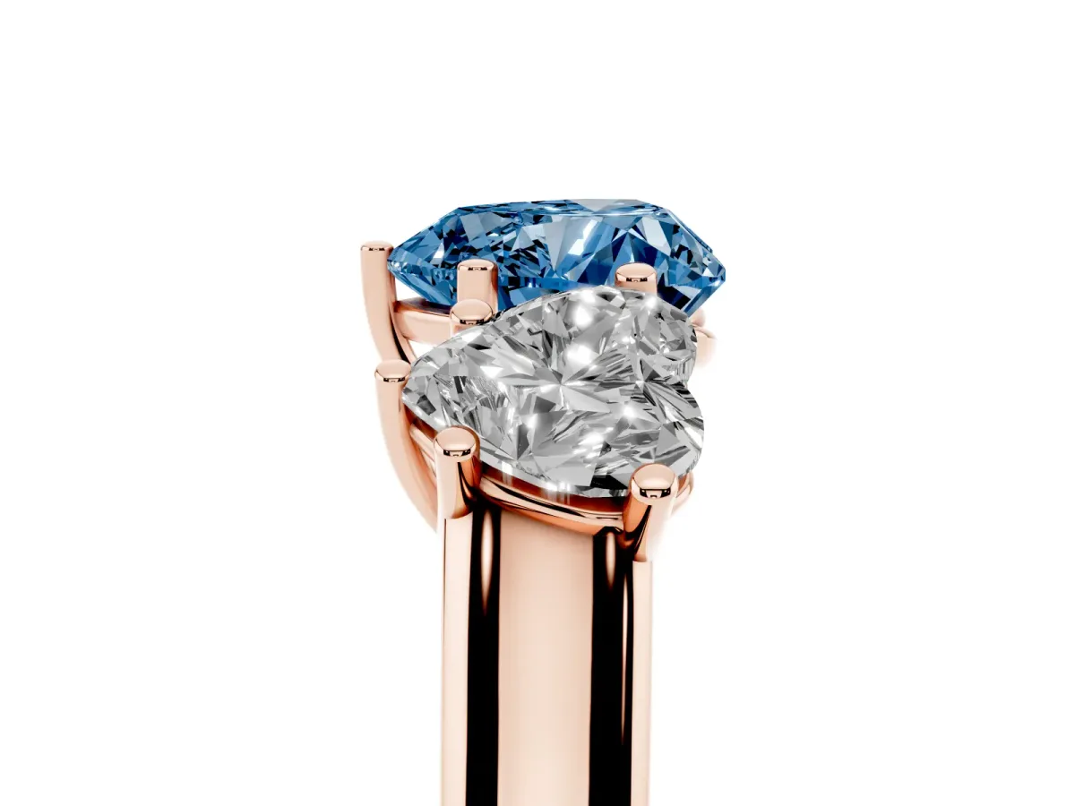 Fancy Blue Heart Cut Three-Stone Diamond Ring with Prong Setting on a Classic Band Rose gold