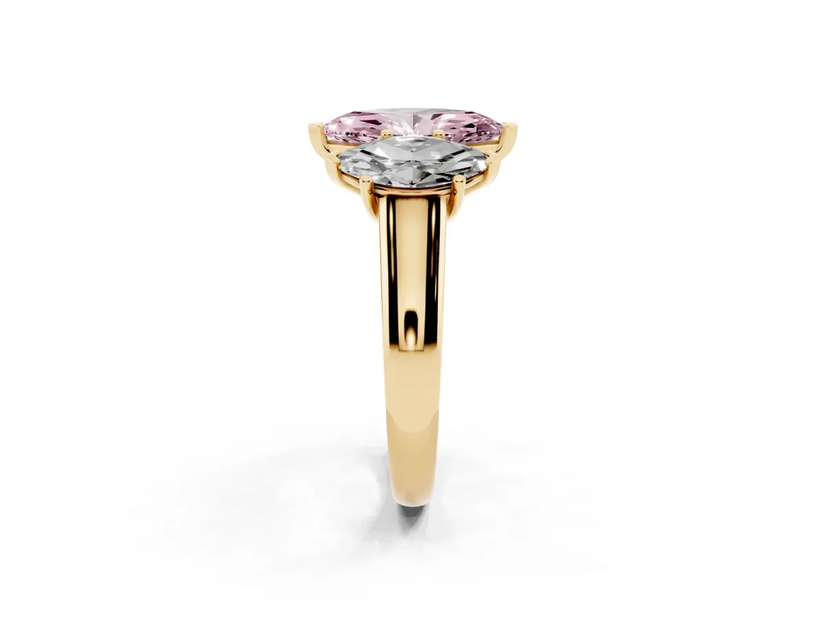 Fancy Pink Marquise Cut Three-Stone Diamond Ring with Prong Setting on a Classic Band Yellow gold
