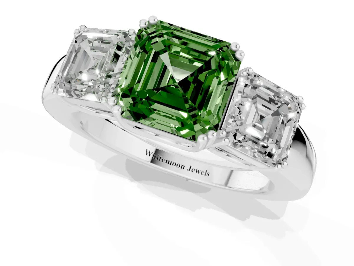 Fancy Green Three-Stone Asscher Cut Cut Diamond Ring with Channel Set Band and Four-Prong Setting Platinum