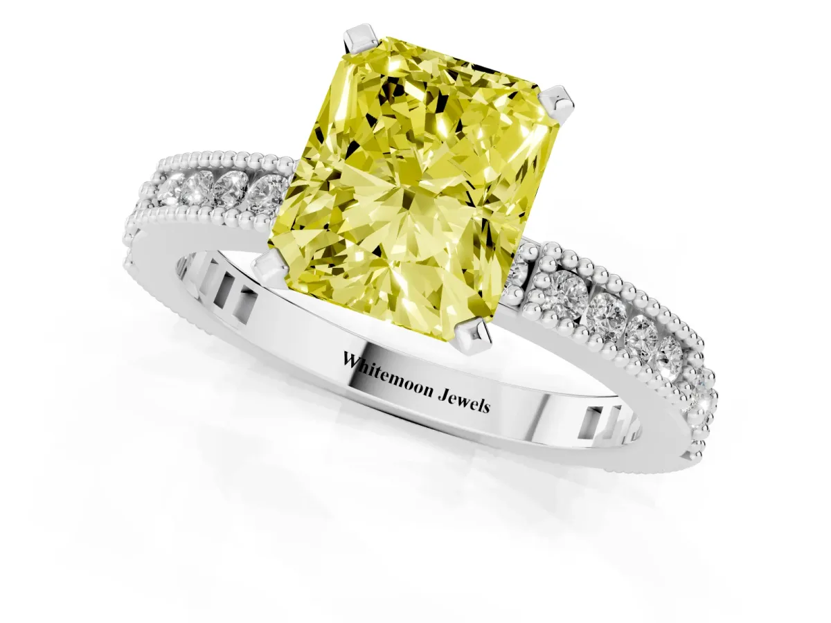 Fancy Yellow Radiant Cut Solitaire with Pavé Band and Four-Prong Setting Silver