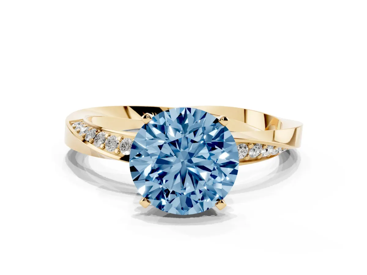 Fancy Blue Round Cut Diamond Engagement Ring with Side Stone Accents and Four-Prong Setting Yellow gold