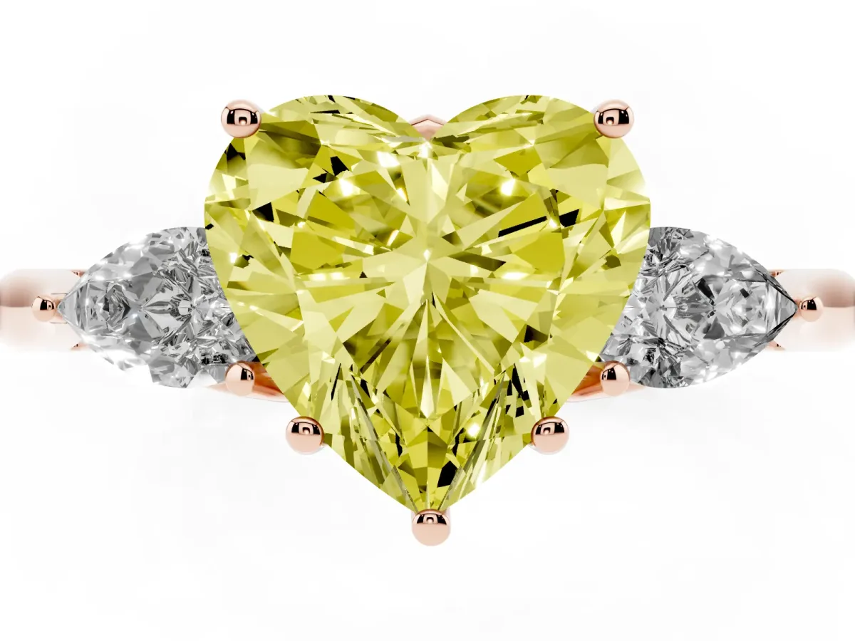 Fancy Yellow Three-Stone Heart Cut Diamond Ring with Pear Side Stones in Four-Prong Setting Rose gold