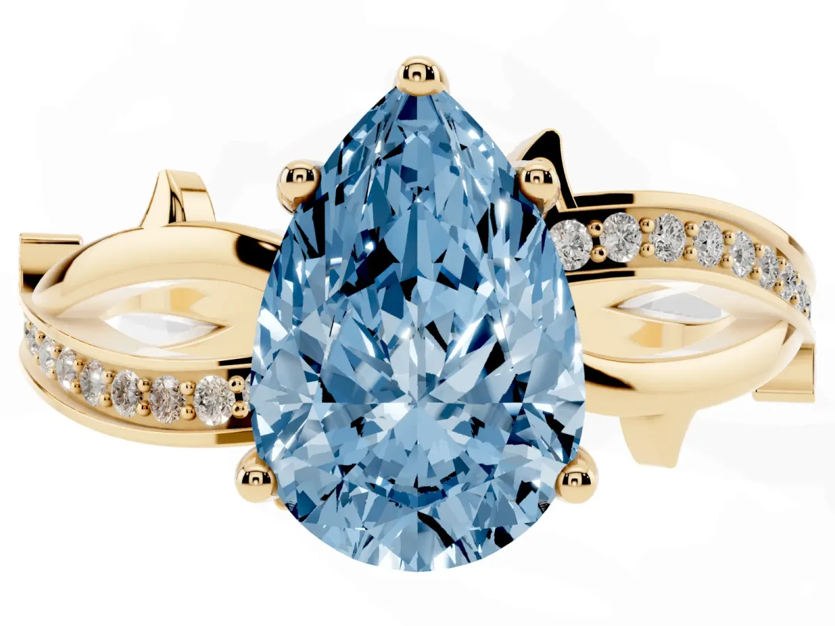 Fancy Blue Pear Cut Solitaire Twist Band with Pavé Accents and Four-Prong Setting Yellow gold