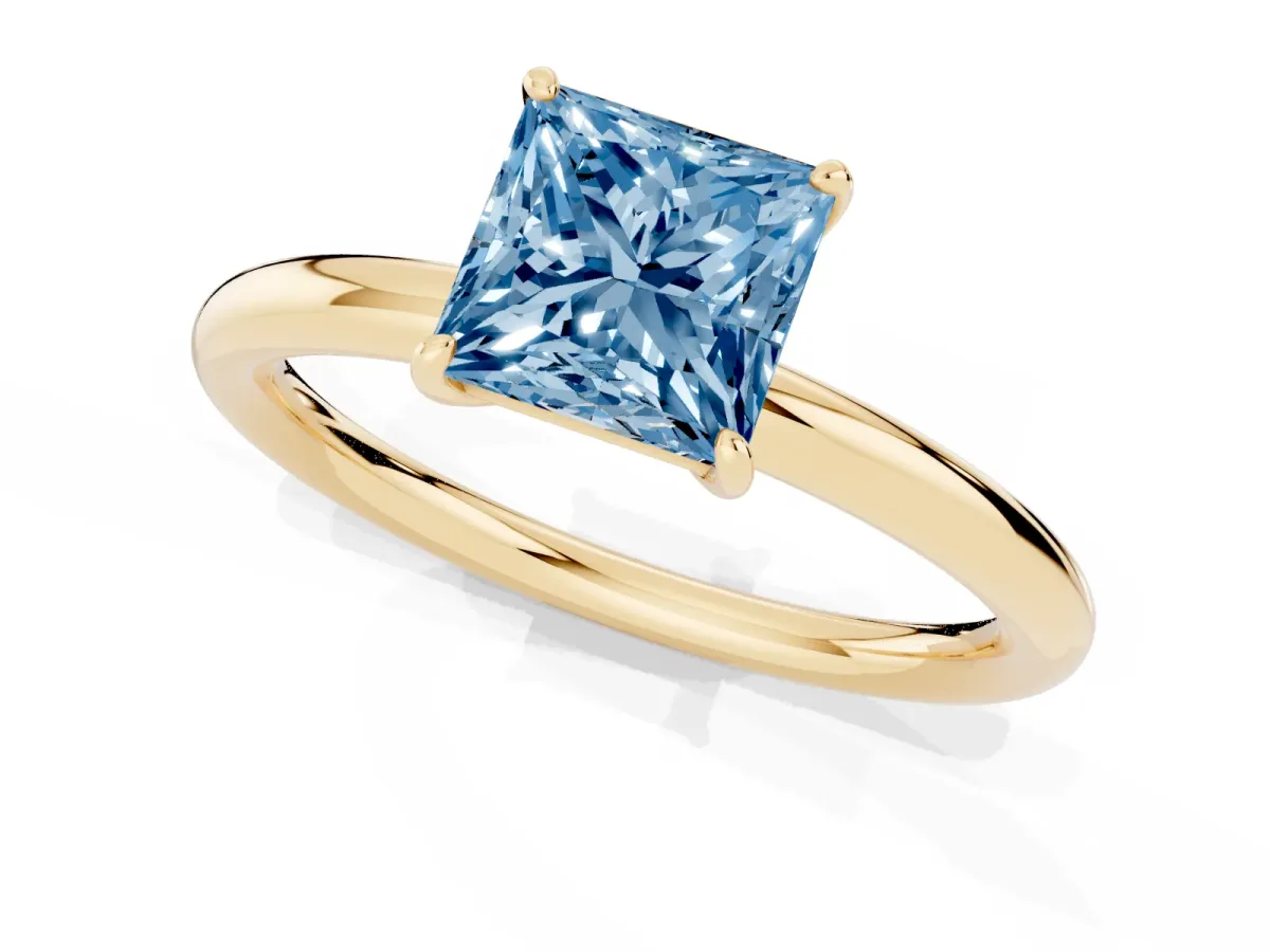 Fancy Blue Princess Cut Solitaire Diamond Ring with Four-Prong Setting on a Plain Band Yellow gold