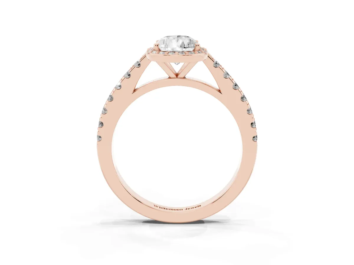 Pear Cut Cut Halo Diamond Engagement Ring with Pave Band and Four-Prong Setting Rose gold