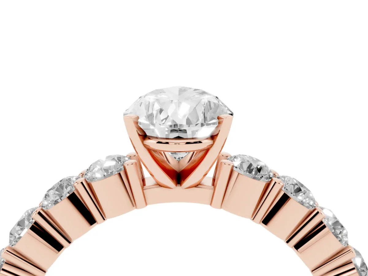 Pear Cut Diamond Solitaire Ring with Shared Prong Round Side Stones Rose gold