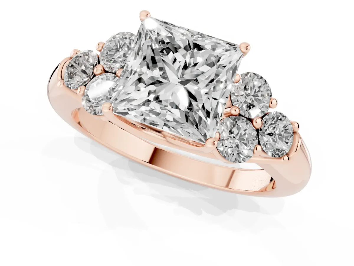 Princess Cut Cut Diamond Cluster Ring with Round Accent Stones and Prong Setting on a Classic Band Rose gold