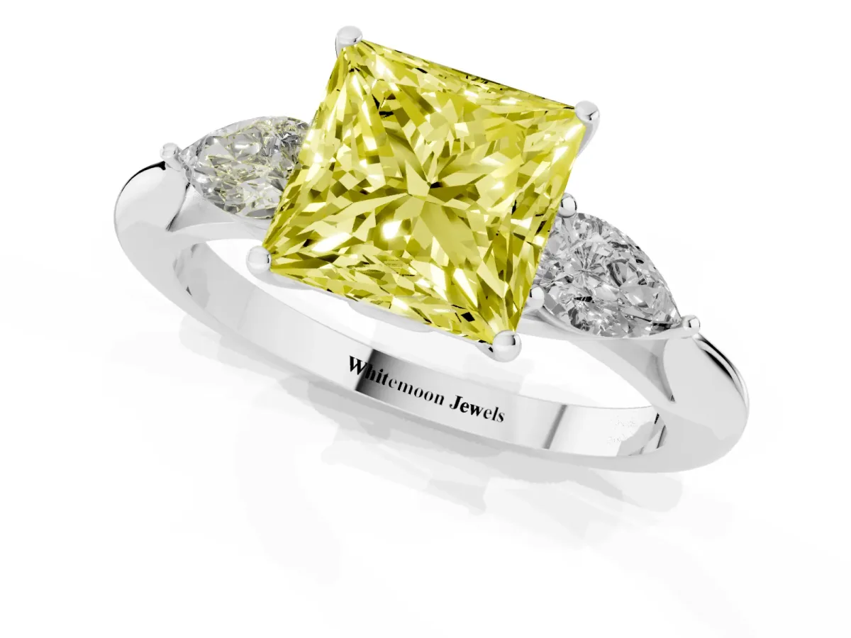 Fancy Yellow Three-Stone Princess Cut Diamond Ring with Pear Side Stones in Four-Prong Setting Silver