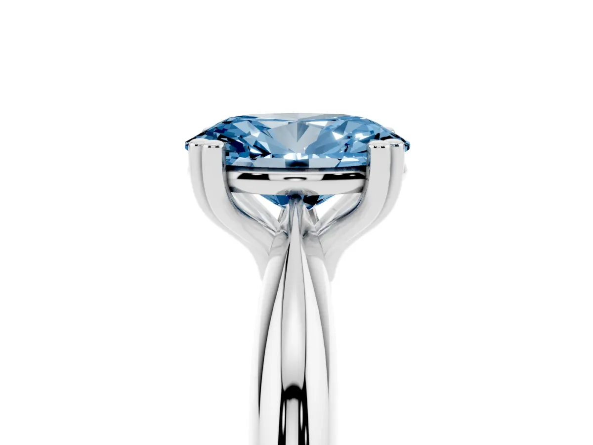 Fancy Blue Oval Cut Cut Solitaire Engagement Ring with Tapered Band and Four-Prong Setting Silver