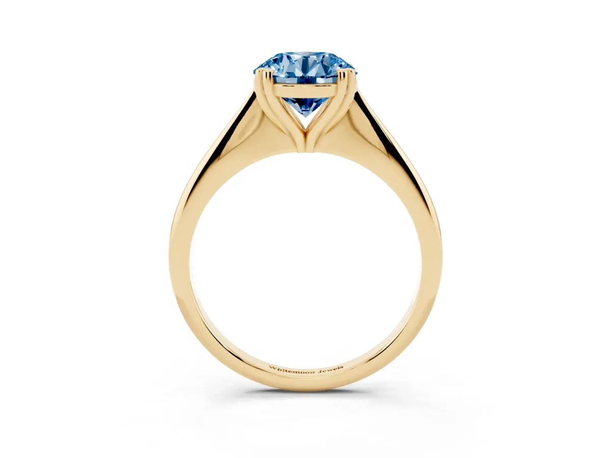 Fancy Blue Round Cut Solitaire Diamond Ring with Six-Prong Setting and Classic Band Yellow gold