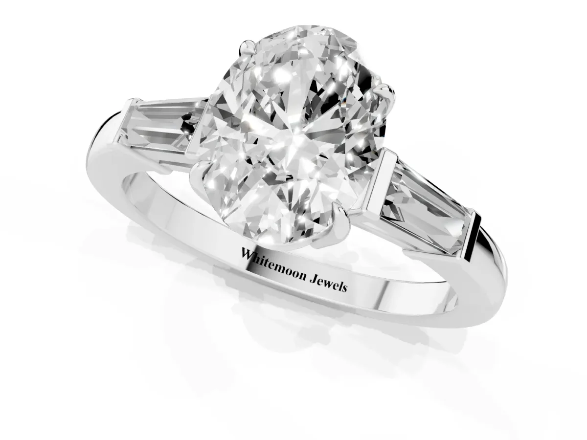 Oval Cut Diamond Three-Stone Ring with Tapered Baguette Side Stones and Prong Setting Silver
