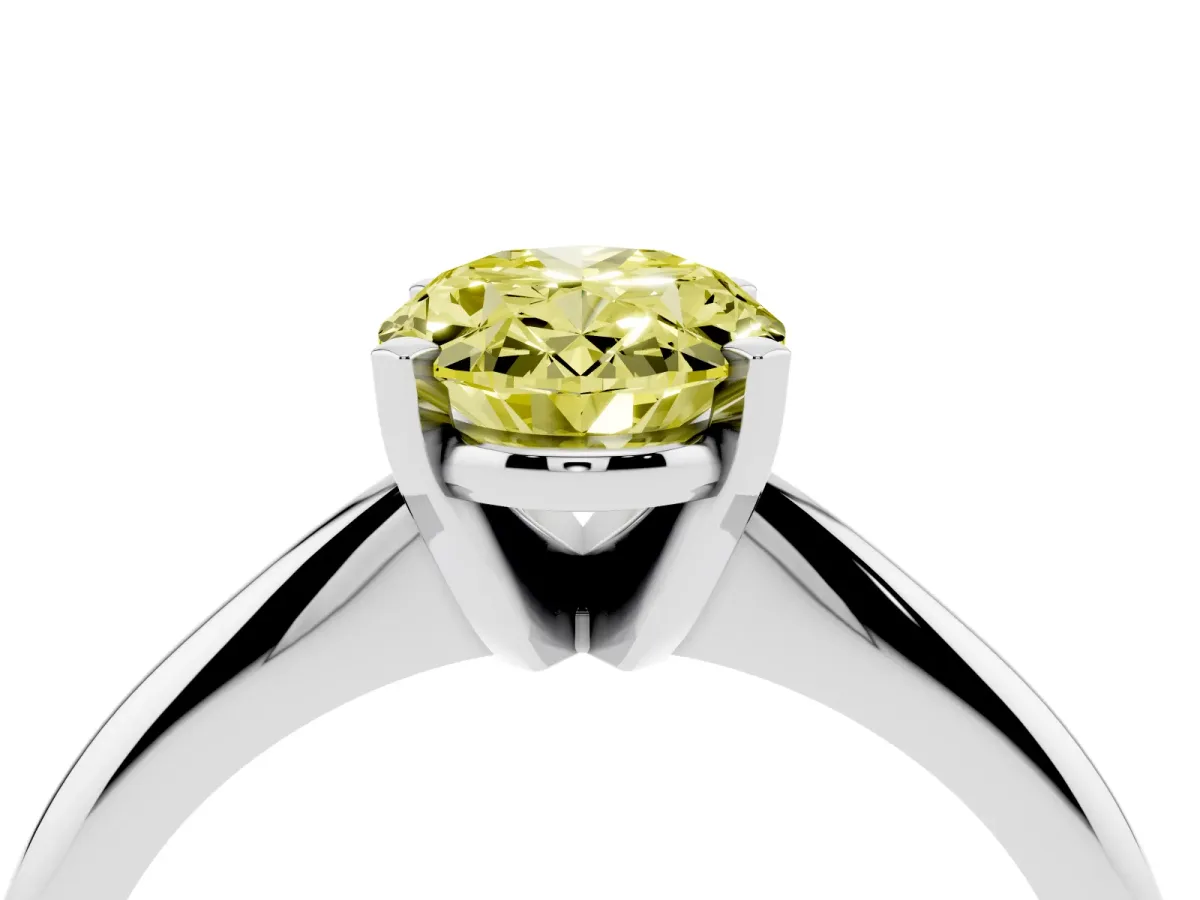 Fancy Yellow Oval Cut Cut Solitaire Ring with Four-Prong Setting on a Classic Band Platinum