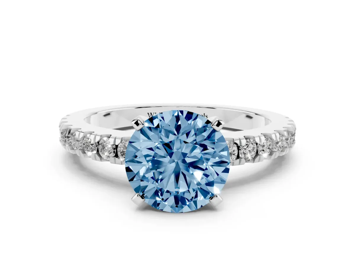 Fancy Blue Round Cut Solitaire Diamond with Pavé Band and Four-Prong Setting Silver