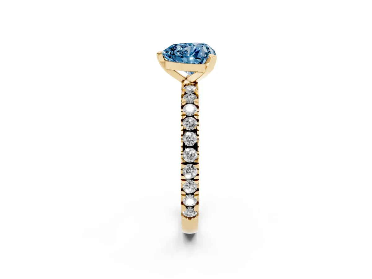 Fancy Blue Heart Cut Diamond Pavé Band Solitaire with Four-Prong Setting Yellow gold