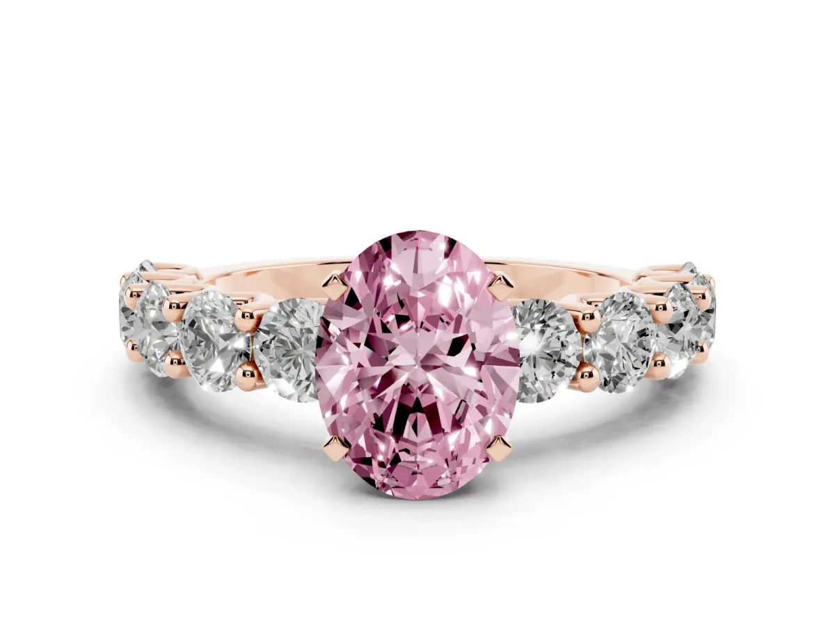 Fancy Pink Oval Cut Diamond Prong Setting with Side Stones on a Pave Band Rose gold