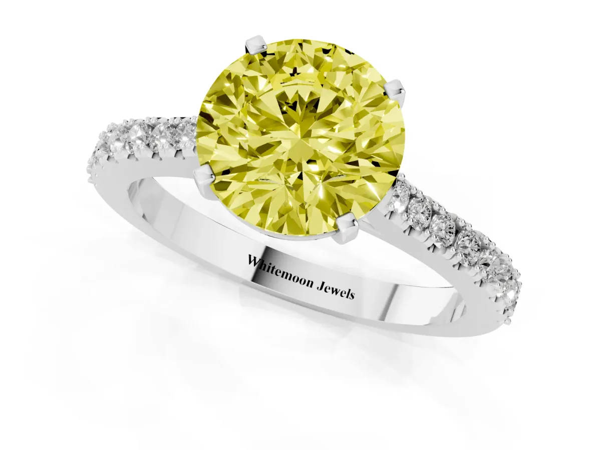 Fancy Yellow Round Cut Cut Solitaire Diamond Engagement Ring with Pave Band and Four-Prong Setting Platinum