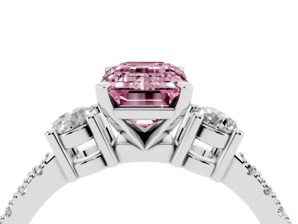 Fancy Pink Emerald Cut Three-Stone Diamond Pavé Band with Prong Setting Platinum