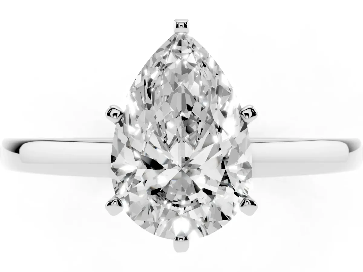 Pear Cut Solitaire Diamond Engagement Ring with Four-Prong Setting on a Classic Band White gold