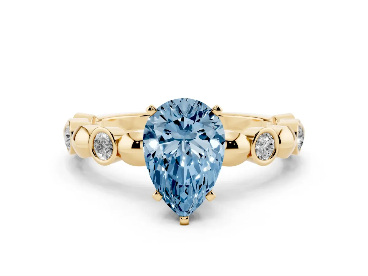 Fancy Blue Pear Cut Solitaire Bezel-Set Diamond Ring with Beaded Band and Four-Prong Setting Yellow gold