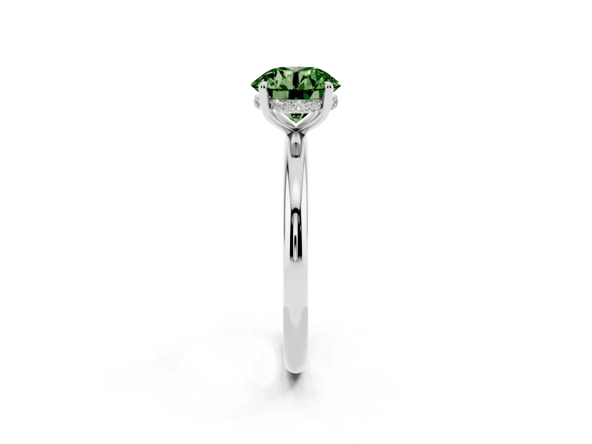 Fancy Green Round Cut Diamond Solitaire Ring with Thin Band and Four-Prong Setting Silver