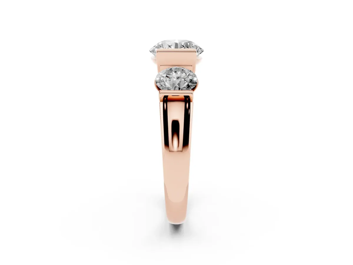 Three-Stone Round Cut Brilliant Diamond Ring with Channel Setting and White Gold Band Rose gold
