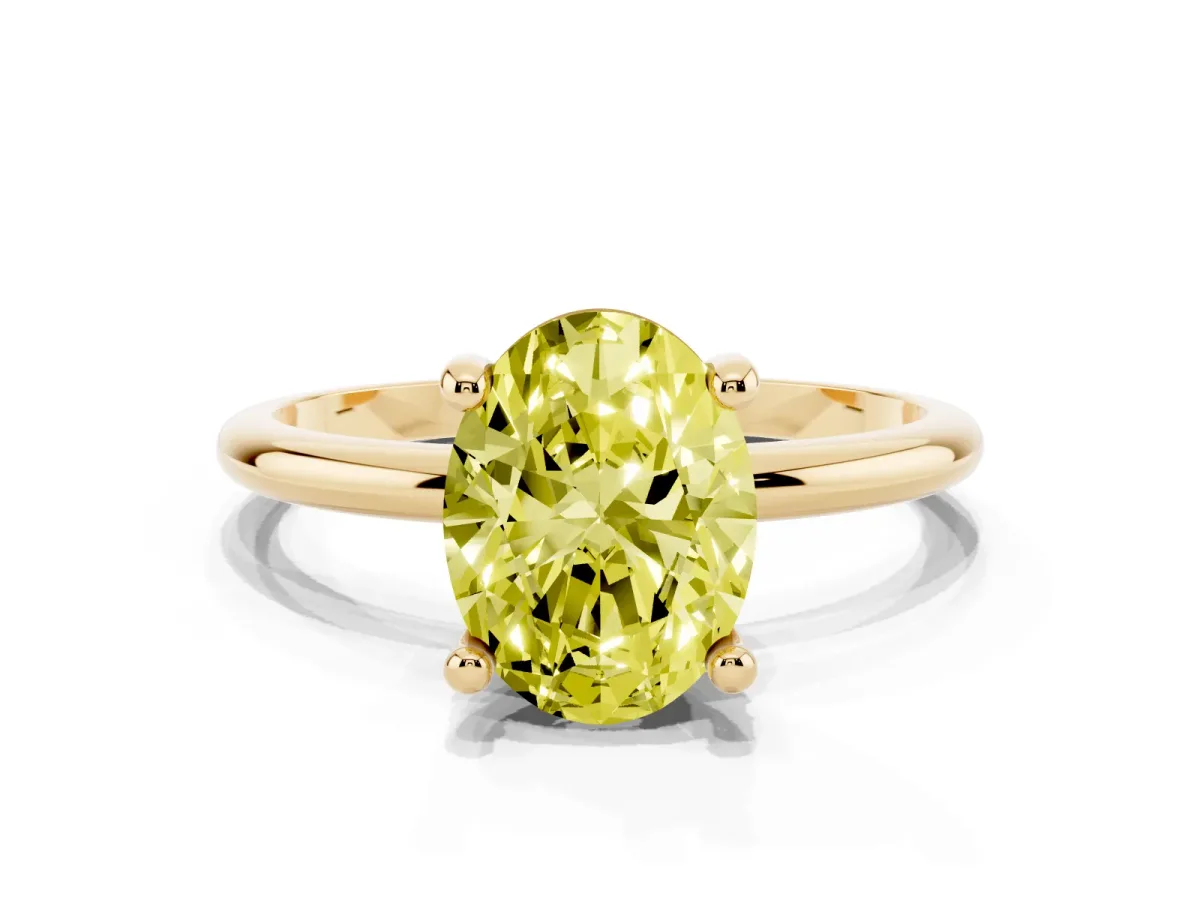 Fancy Yellow Oval Cut Solitaire Diamond Ring with 4-Prong Setting on a Classic Band Yellow gold