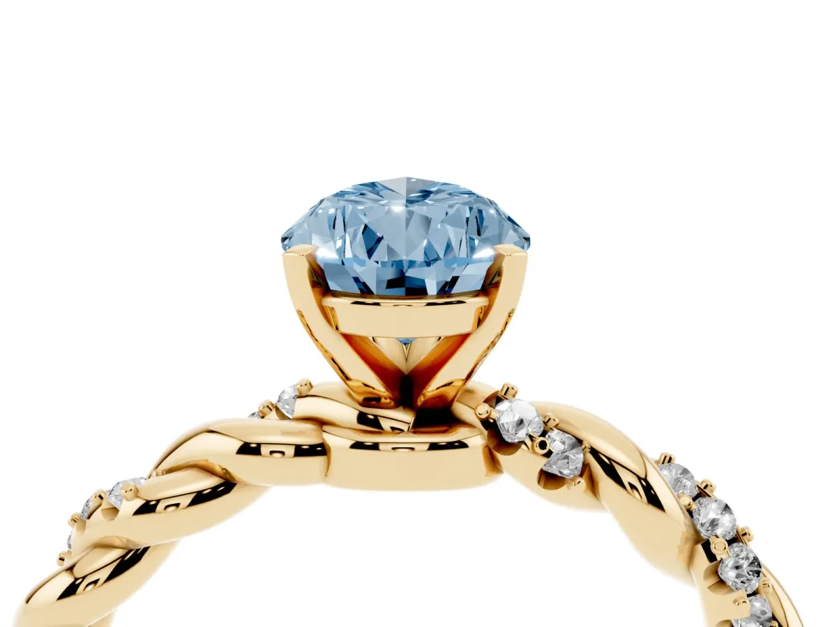 Fancy Blue Pear Cut Diamond Solitaire Ring with Twisted Band and Pavé Accents Yellow gold