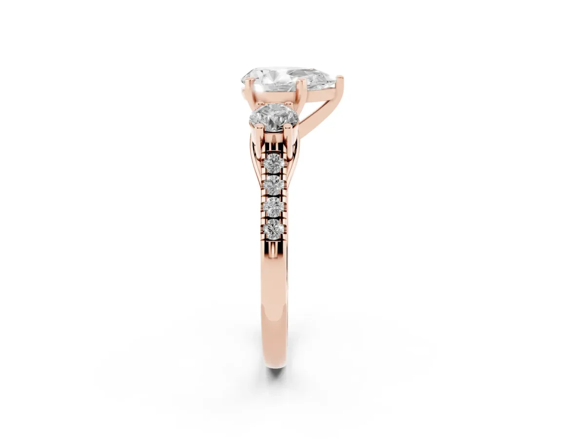 Three-Stone Pear Cut Diamond Pavé Band with Four-Prong Setting Rose gold