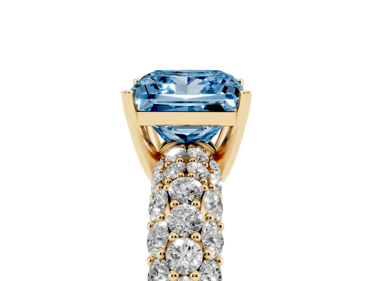 Fancy Blue Princess Cut Diamond Pavé Band Solitaire Ring with Four-Prong Setting Yellow gold