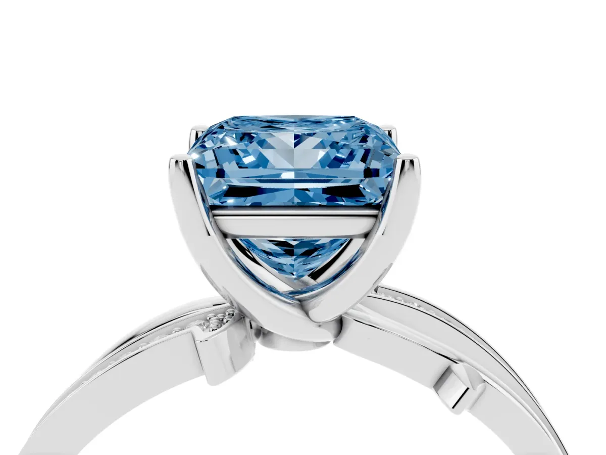 Fancy Blue Princess Cut Solitaire Twist Band with Pavé Accents and Four-Prong Setting Silver