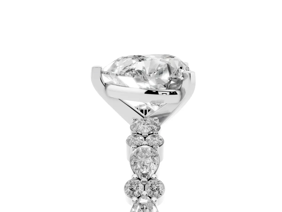 Heart Cut Diamond Side Stone Solitaire Ring with Round and Four-Prong Setting White gold