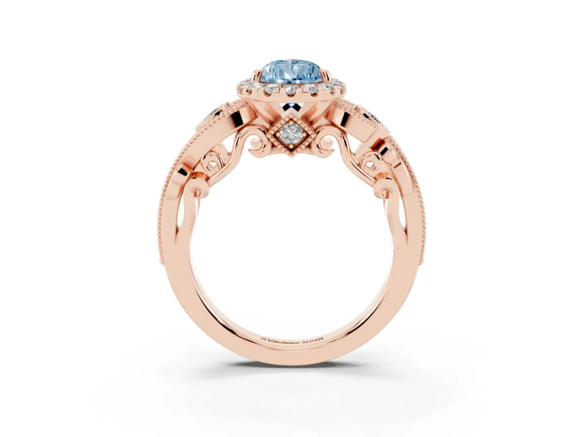 Fancy Blue Pear Cut Halo Diamond Ring with Milgrain and Bezel Accents on a Split Shank Band Rose gold