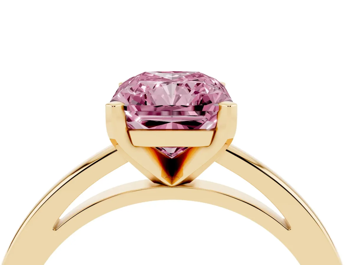 Fancy Pink Radiant Cut Solitaire Diamond Engagement Ring with Four-Prong Setting on a Classic Band Yellow gold