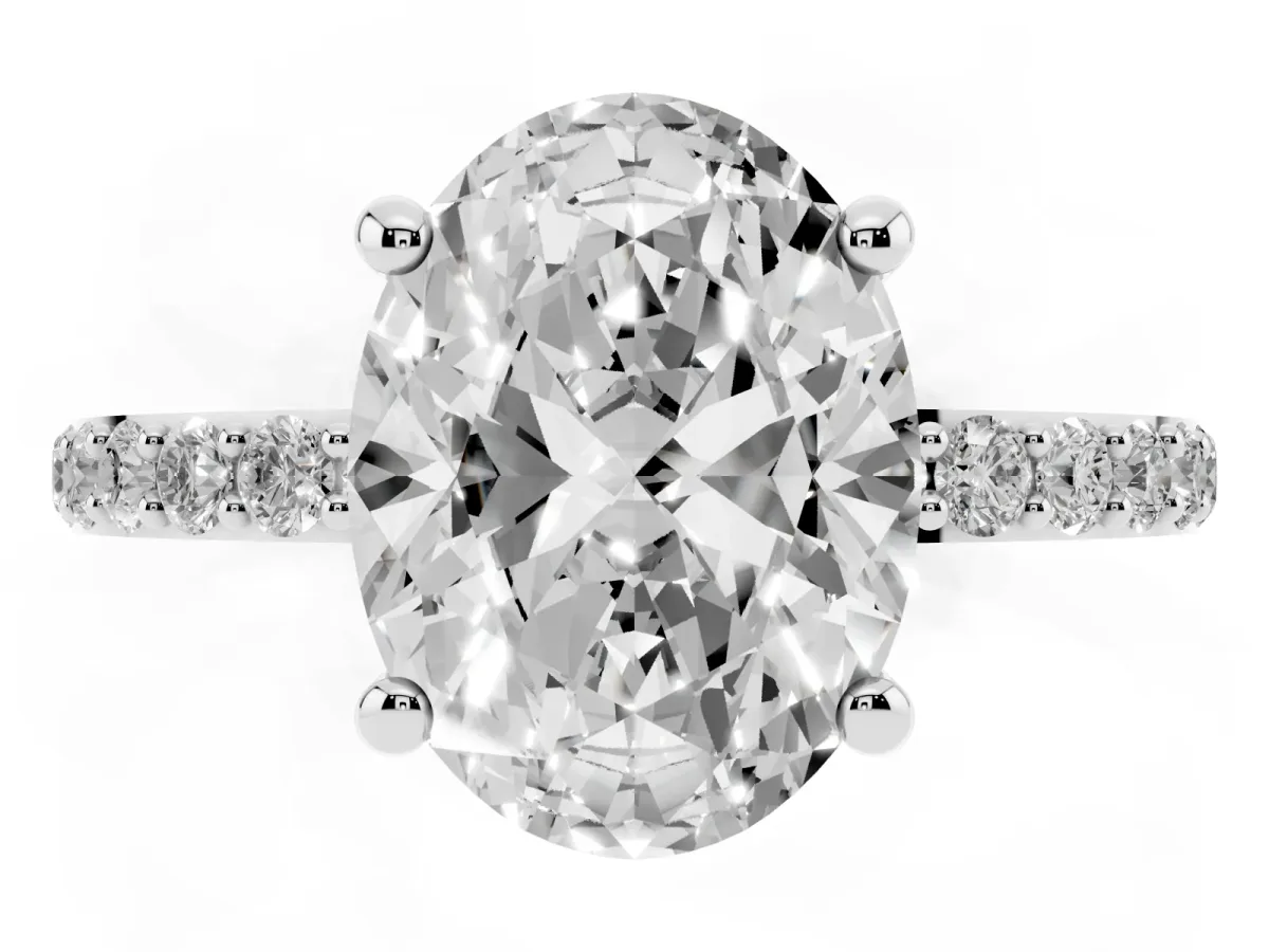 Oval Cut Diamond Solitaire Ring with Round Pavé Band and Prong Setting Silver
