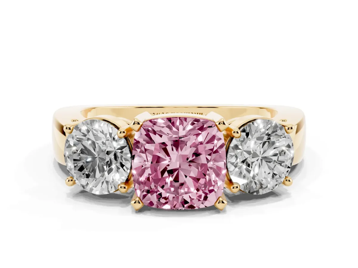 Fancy Pink Three-Stone Cushion Cut Diamond Ring with Round Side Stones, Classic Band, and Four-Prong Setting Yellow gold