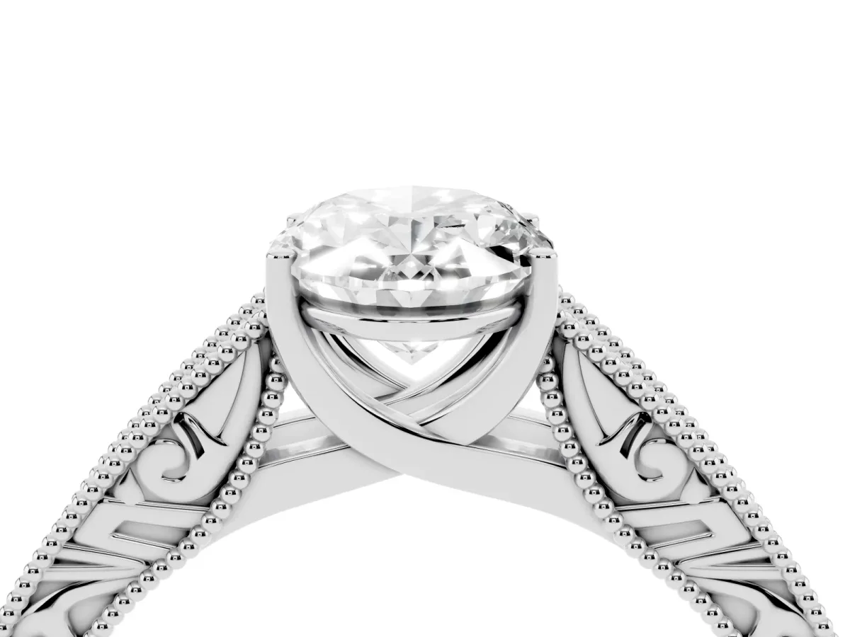 Oval Cut Diamond Solitaire Ring with Engraved Band and Four-Prong Setting Silver