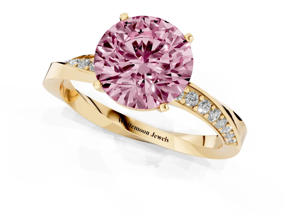 Fancy Pink Round Cut Diamond Engagement Ring with Side Stone Accents and Four-Prong Setting Yellow gold