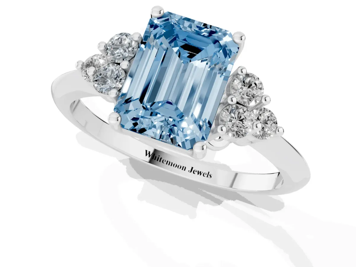 Fancy Blue Emerald Cut Cut Diamond Cluster Ring with Solitaire Band and Four-Prong Setting Platinum
