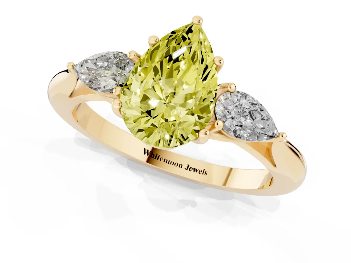 Fancy Yellow Three-Stone Pear Cut Brilliant Diamond Solitaire Ring with Tapered Band and Four-Prong Setting Yellow gold